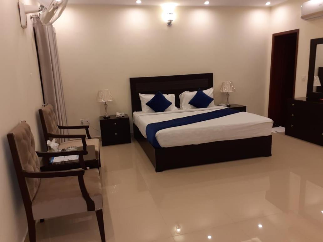 Hotel Noor Plaza Lahor Kültér fotó